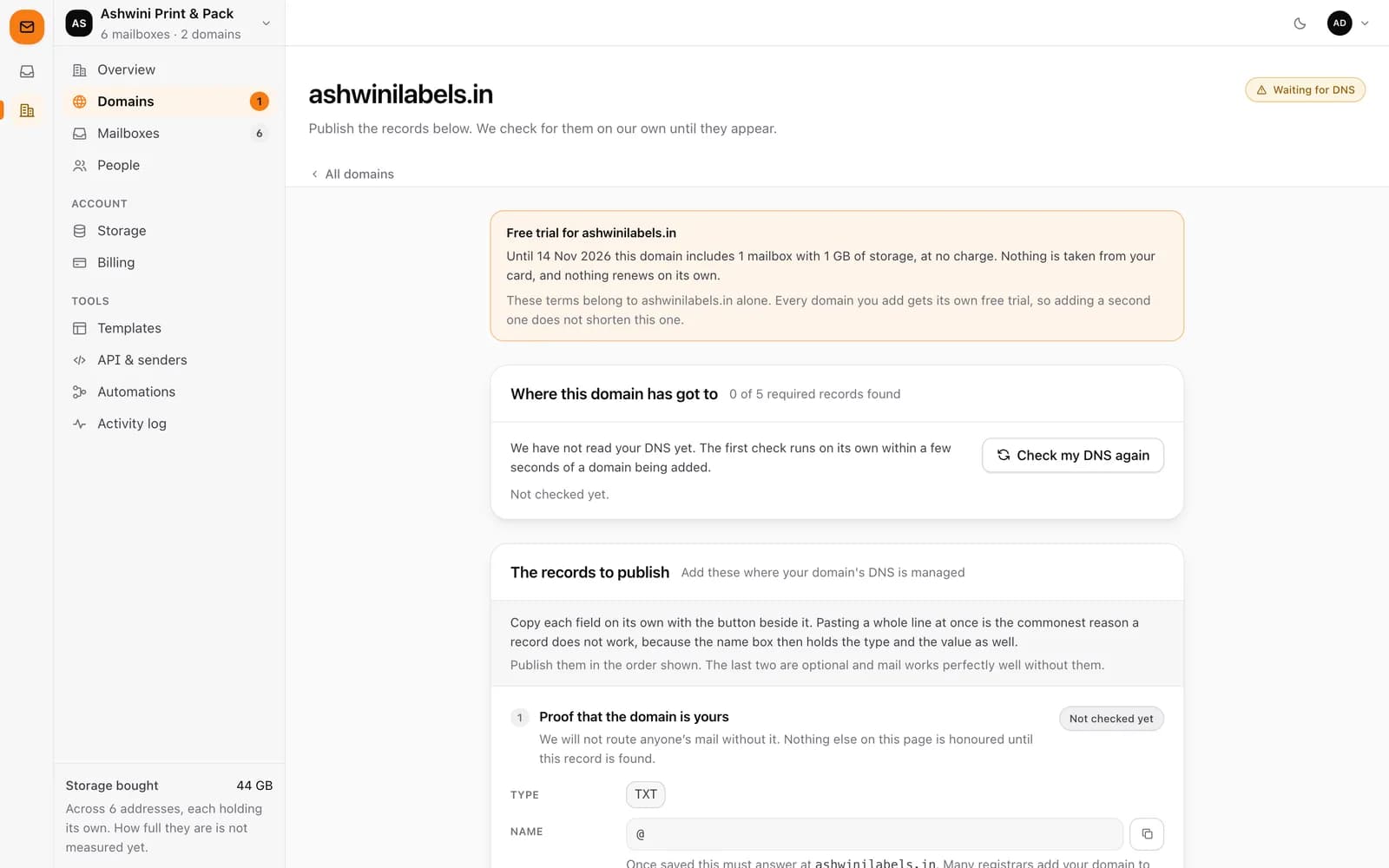 Newly added domain waiting for DNS, with free-trial notice, record check status and the records to publish